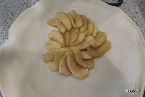 Placing apples on crust